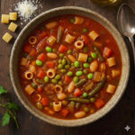 Rustic Sicilian Minestrone soup with navy beans, fennel, and ditalini pasta.
